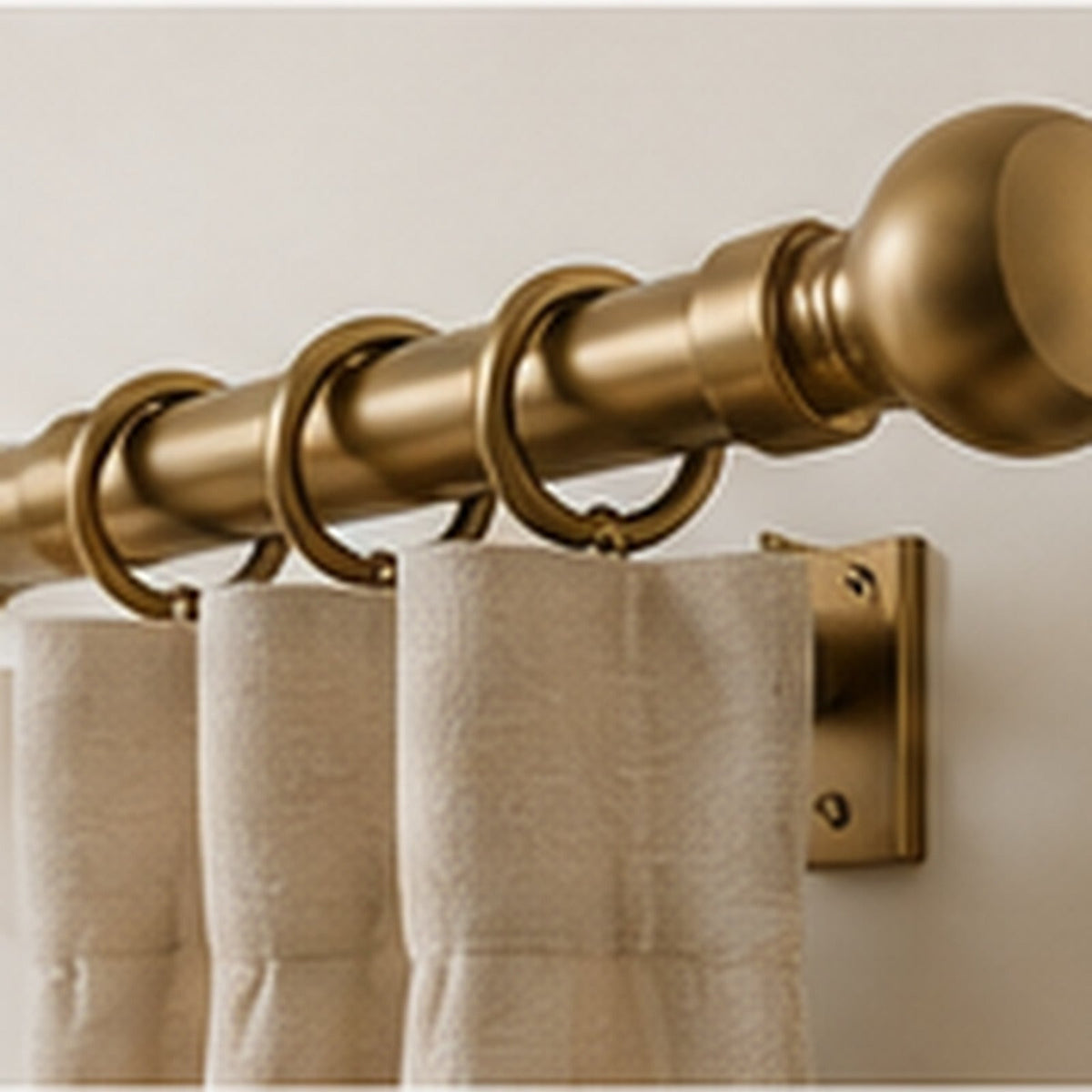 Curtain pole with rings over a concealed track