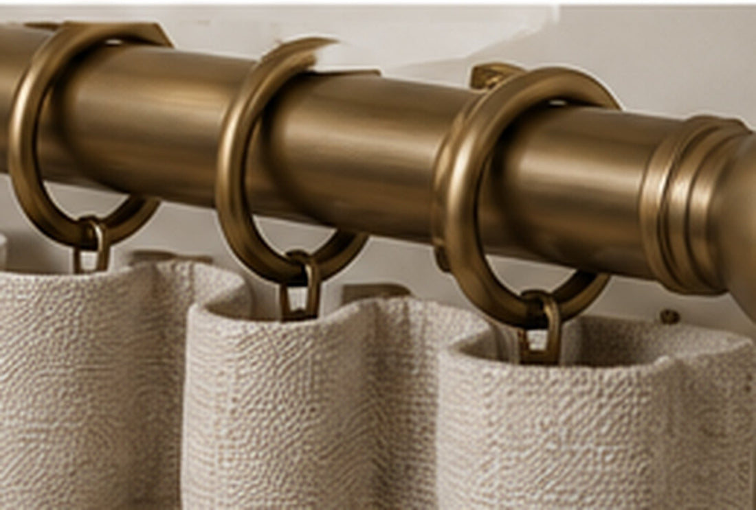 Curtain pole bracket fixed to a wall